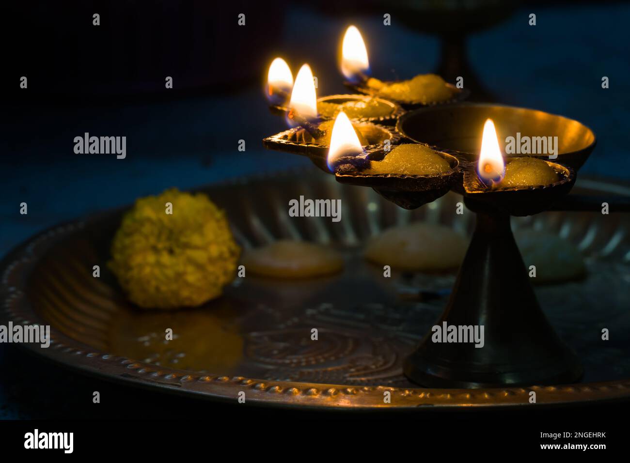 hindu puja essential panch pradeep or five headed oil lamp burning with