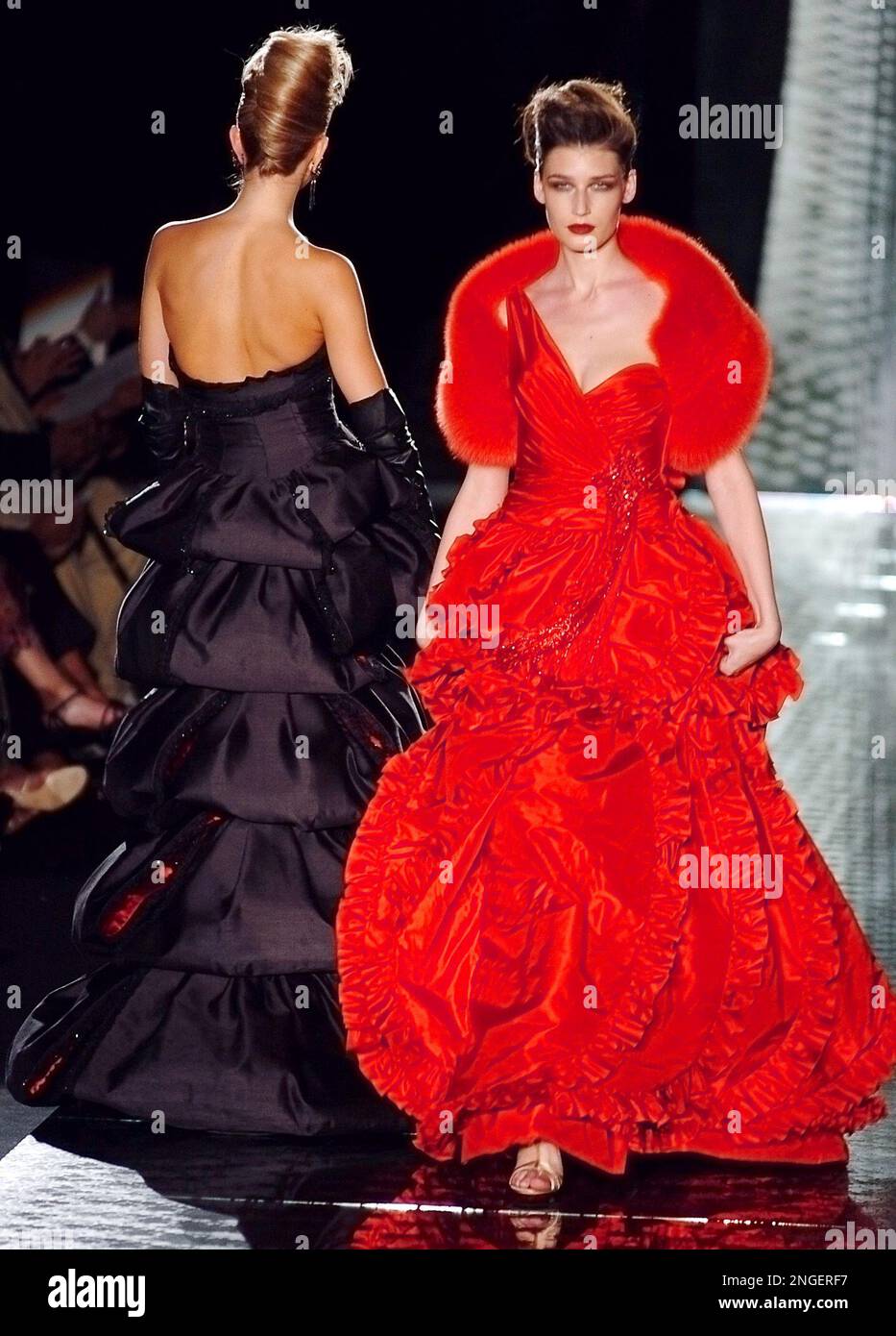 Models present evening dresses by Italian fashion designer Valentino during his Fall Winter 2004 2005 fashion show in Paris Thursday July 6 2004. AP Photo Francois Mori Stock Photo Alamy