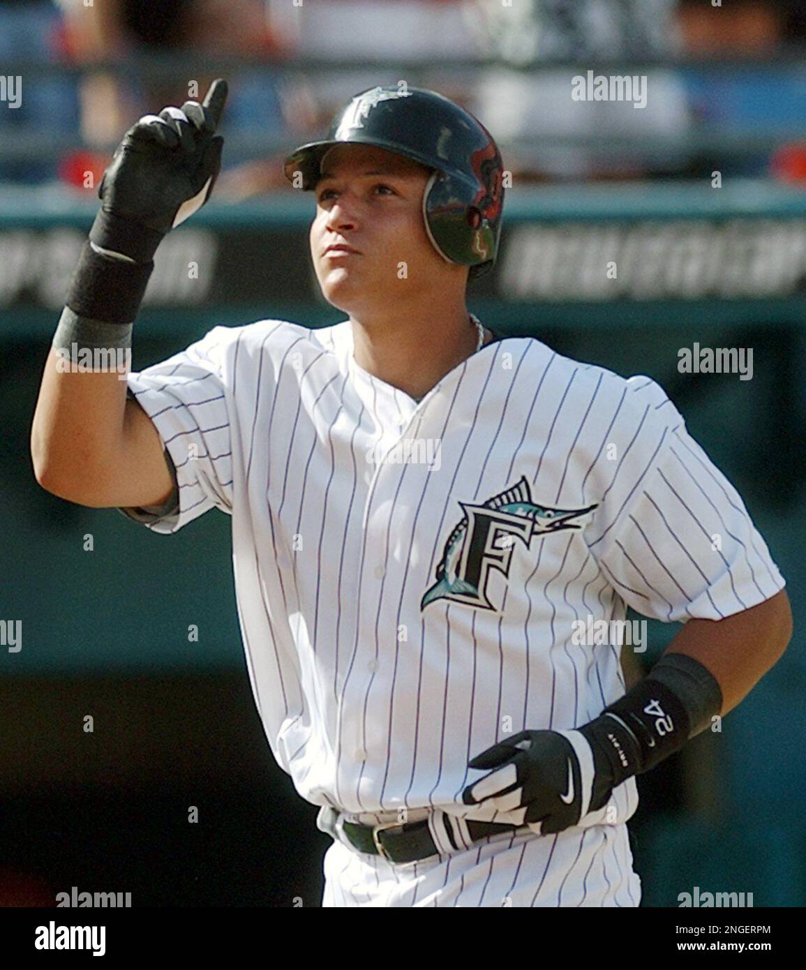 Florida Marlins' Miguel Cabrera celebrates after hitting a solo home run  off Tampa Bay Devil Rays' John Halama in the fifth inning Sunday, July 4,  2004, in Miami. (AP Photo/Alan Diaz Stock