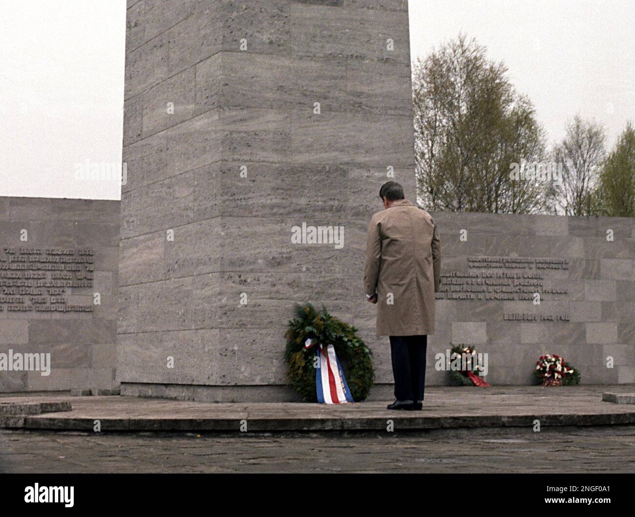 U.S. President Ronald Reagan lays a wreath at the memorial obelisk on ...