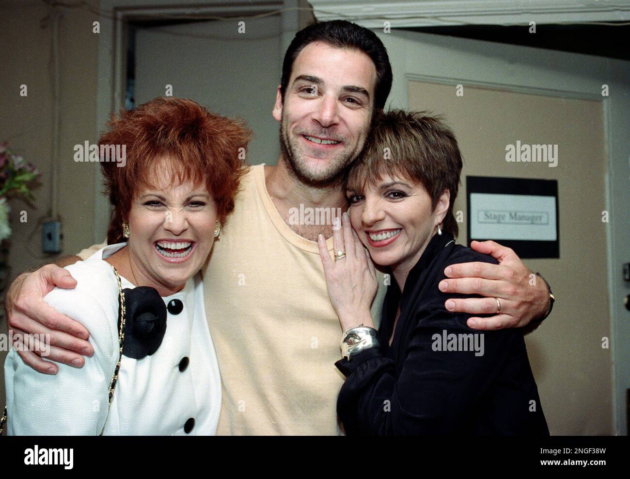 Actorsinger Mandy Patinkin, center, poses with sisters Lorna Luft