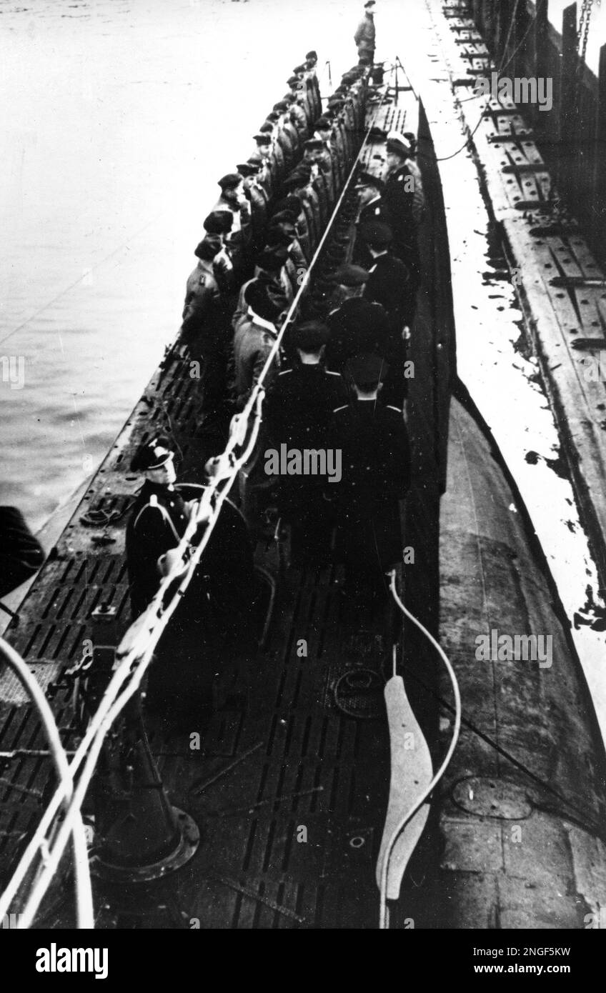 Victorious German U Boat crew members line up for roll call on the