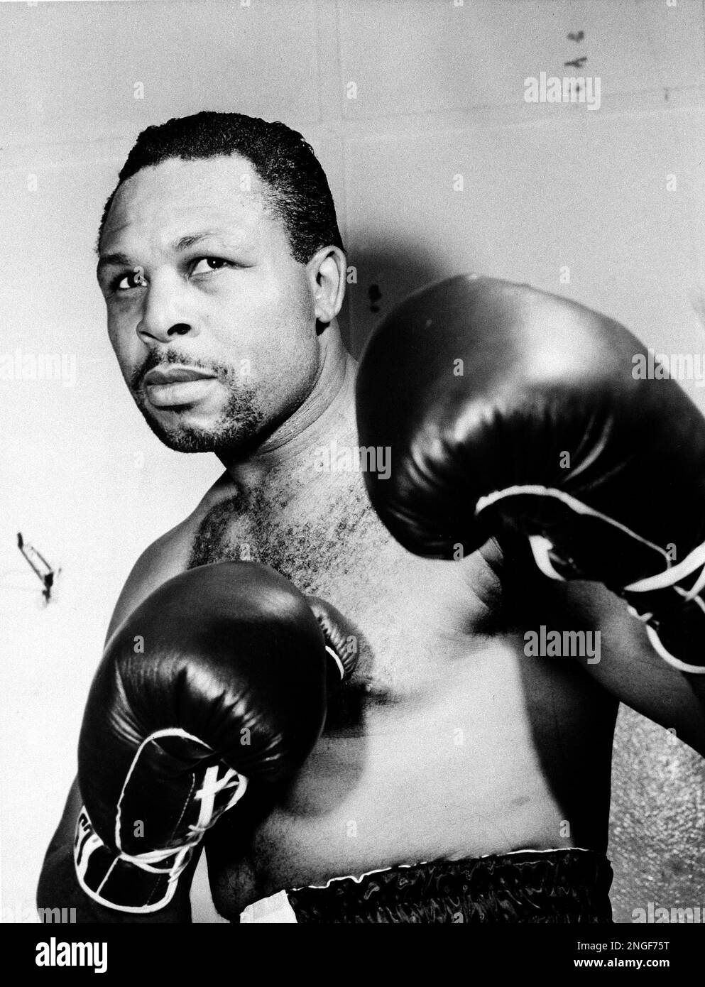 Light heavyweight boxer Archie Moore is shown in an action pose in 1955