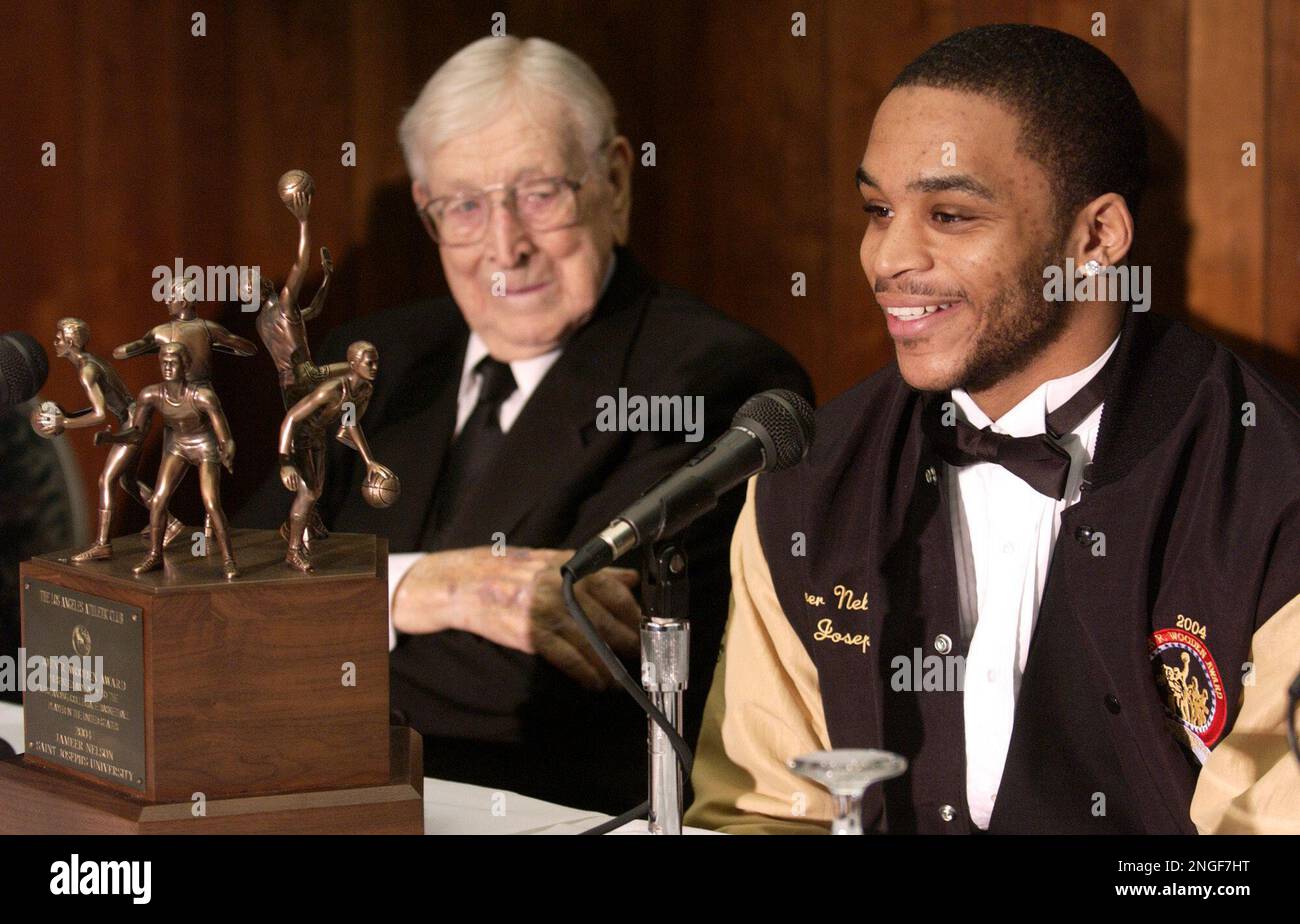 Saint Joseph's basketball player Jameer Nelson, right, addresses