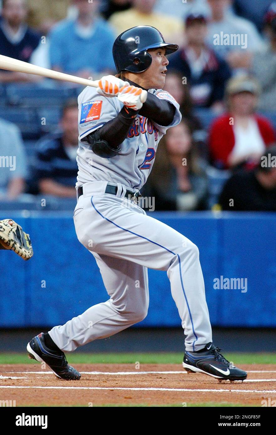 New York Mets' rookie Kazuo Matsui hits a home run off Atlanta Braves