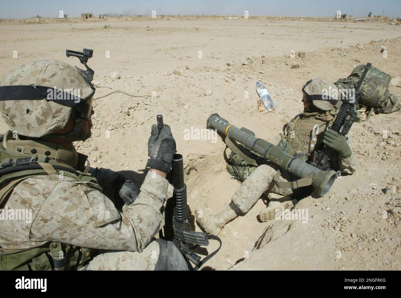 U. S. Pfc. Jason Rush of Boise, ID., left, and Lcpl Alex Lemarr of Del