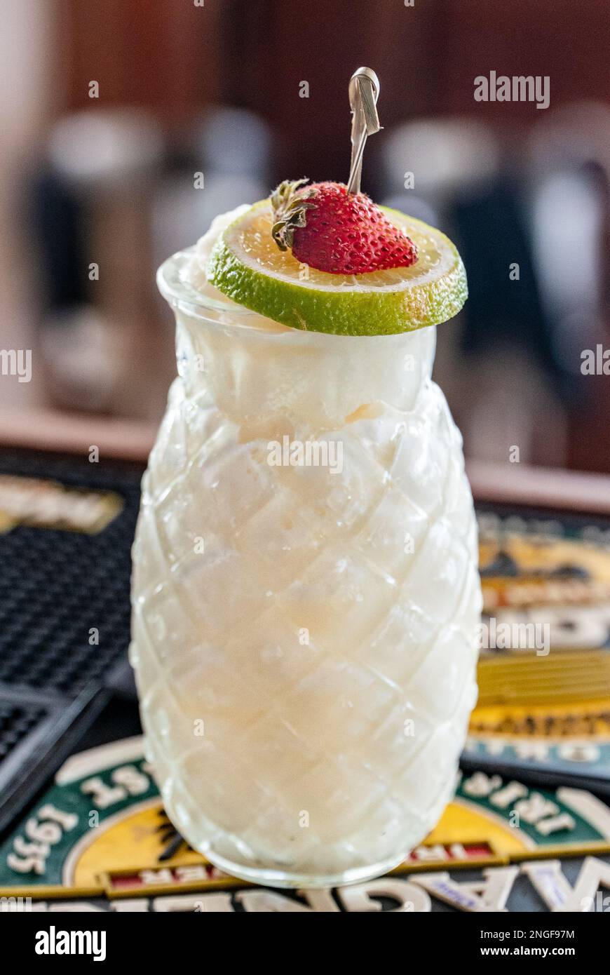 A image of a tasty alcoholic Pina colada cocktail at a local bar Stock
