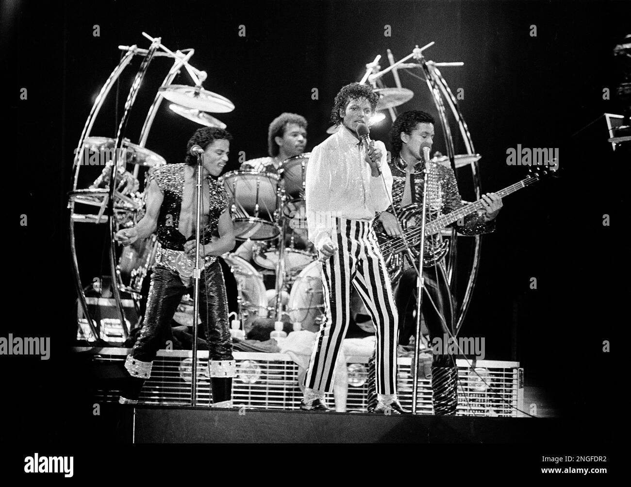 Pop artist Michael Jackson, center, is joined by his brothers Tito