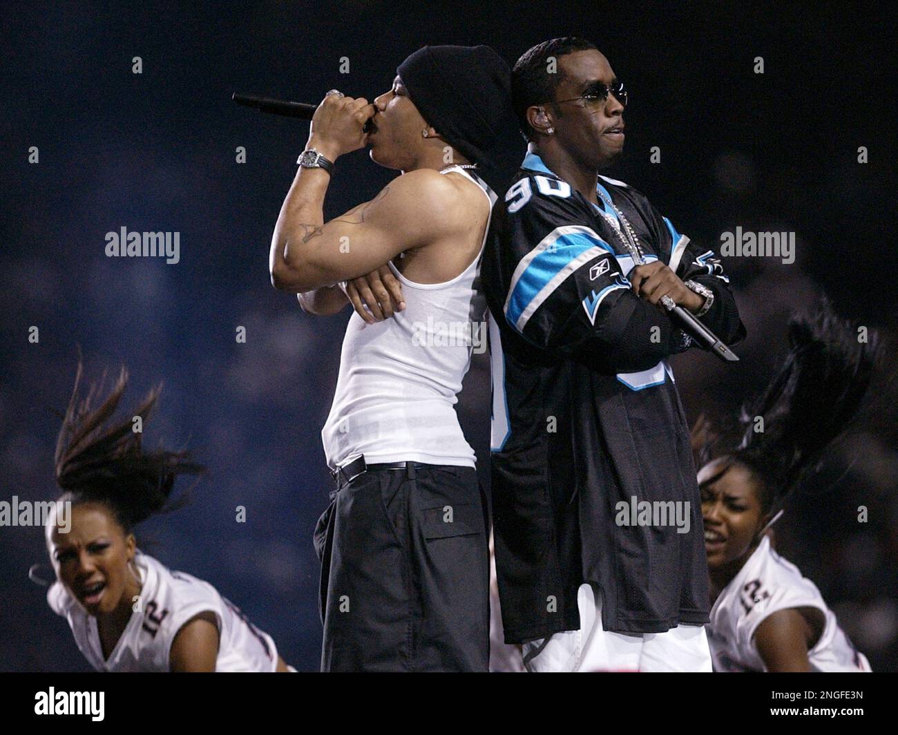 Nelly, left, and P. Diddy, right, perform during halftime of Super Bowl  XXXVIII, Sunday, Feb. 1, 2004, in Houston. (AP Photo/Amy Sancetta Stock  Photo - Alamy