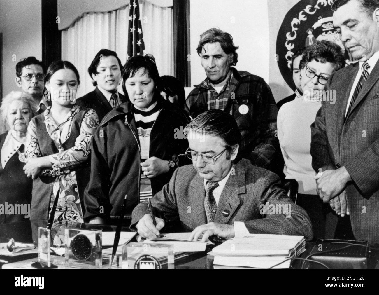 Representatives of the Menominee Indians gather around Wisconsin Gov