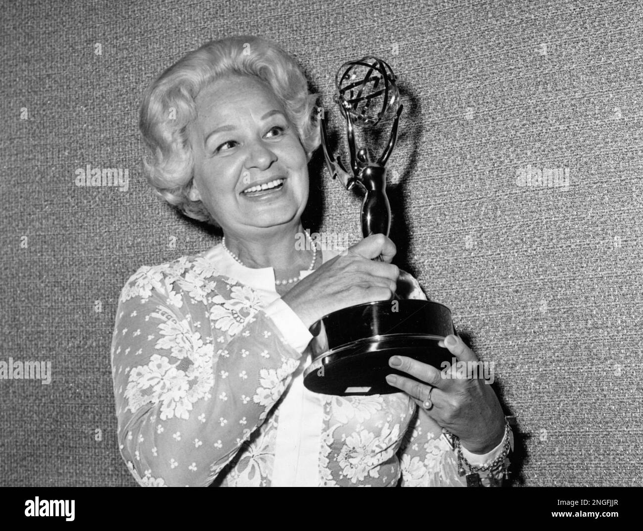 Actress Shirley Booth poses with her Emmy award at the 19th annual