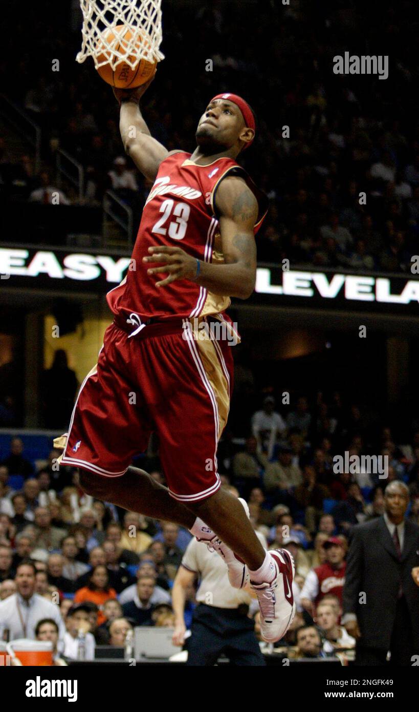 Cleveland Cavaliers' LeBron James dunks the ball against the Denver Nuggets  in the first quarter Wednesday, Nov. 5, 2003 in Cleveland, Ohio. (AP  Photo/Ron Schwane Stock Photo - Alamy, image size:819x1390