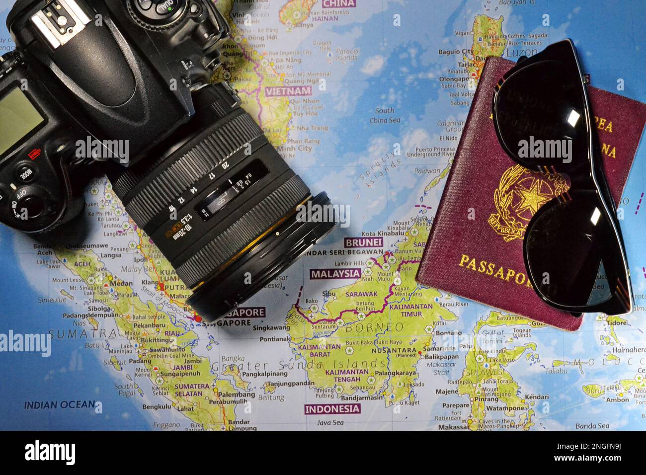 Travel concept - Camera, passport and map Stock Photo