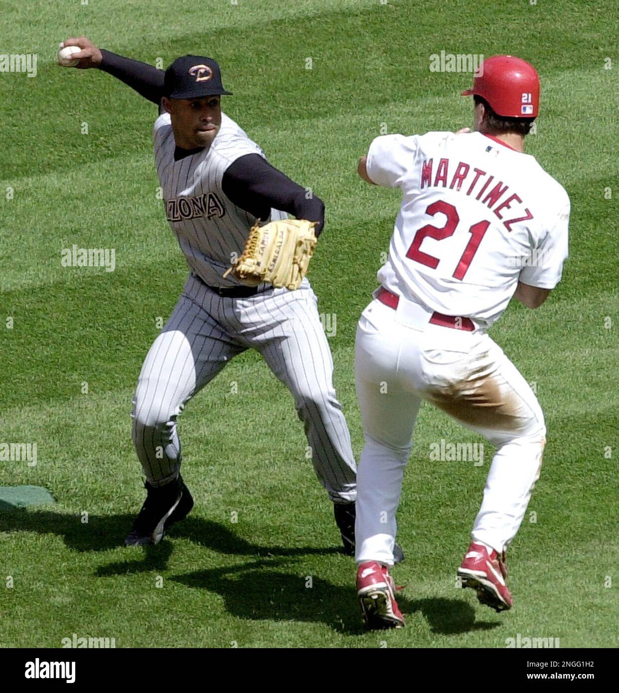 Martinez pitches, hits Cardinals past Giants