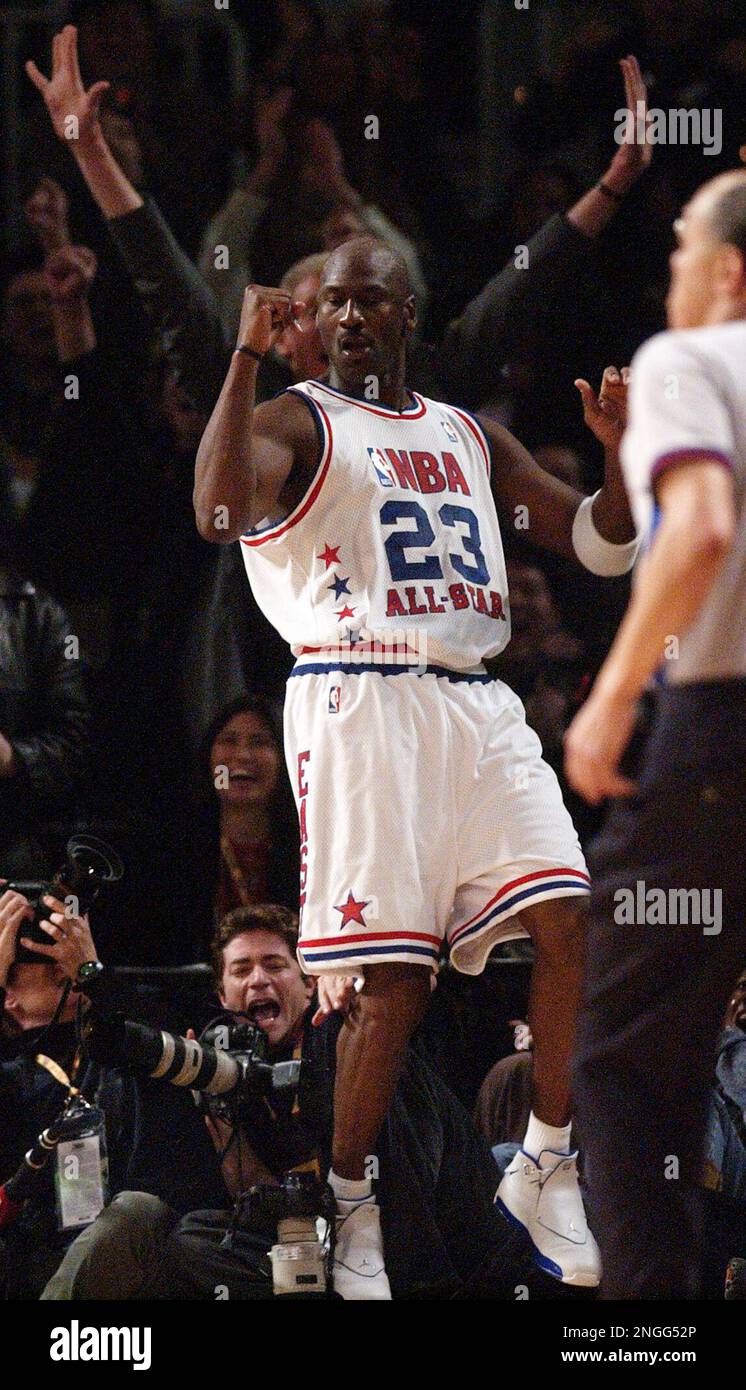 Washington Wizards Michael Jordan and the crowd react after his shot pulled  the East ahead by two towards the end of the first overtime in the 2003 NBA  All Star Game in