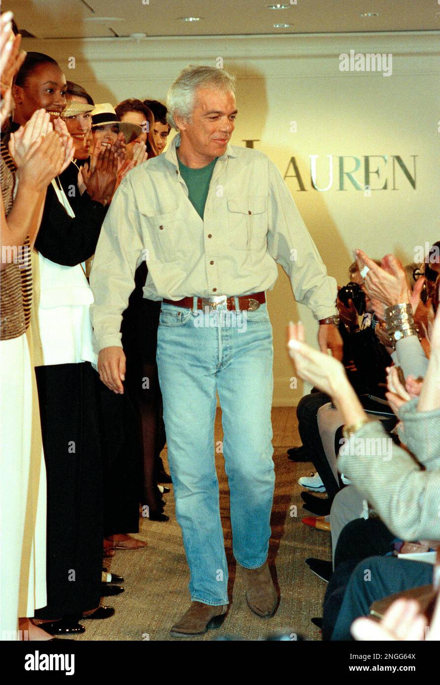 American fashion designer Ralph Lauren is applauded as he walks on the ...