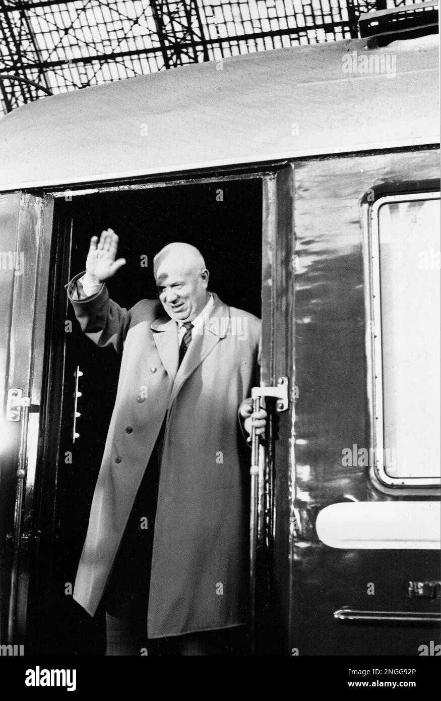 Soviet Premier Nikita Khrushchev waves from the doorway of a train as he leaves Moscow for a trip to Romania, June 15, 1962. (AP Photo) Stock Photo