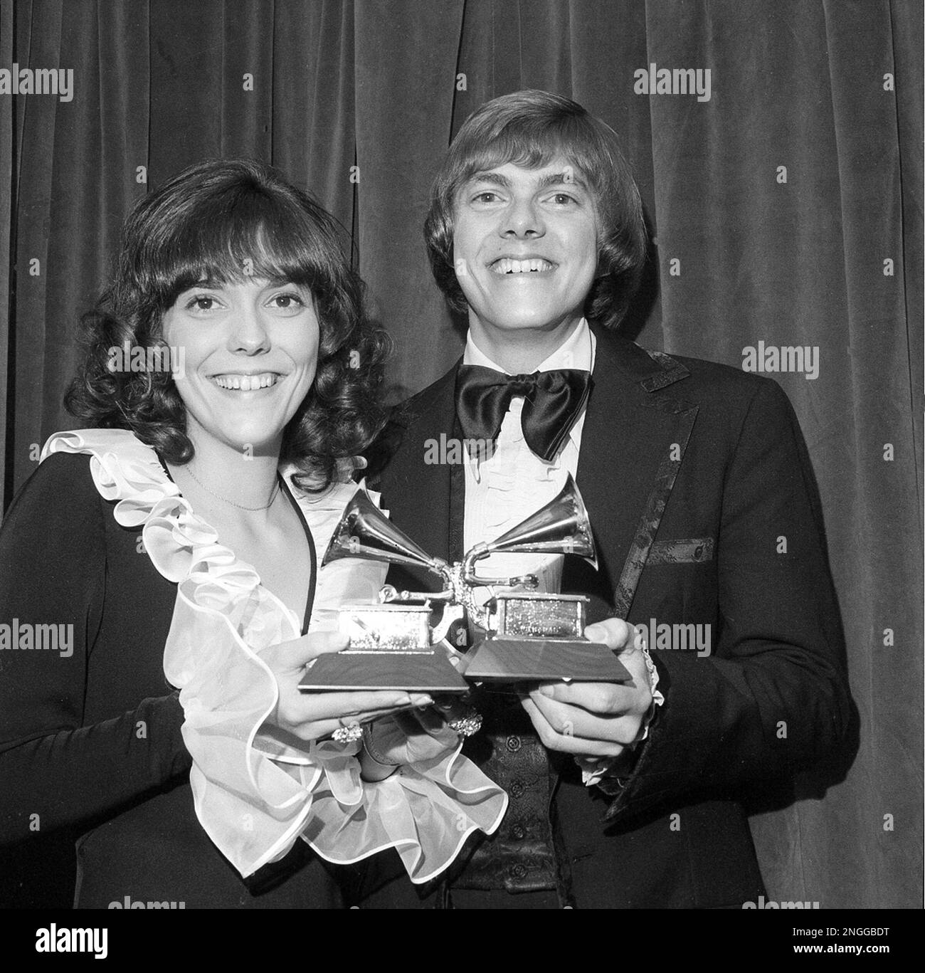 Karen and Richard Carpenter pose with their Grammys during the 14th