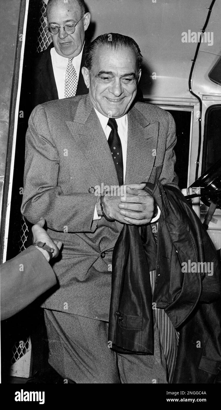 A handcuffed Vito Genovese arrives at court in New York City in 1959 on a narcotics conspiracy