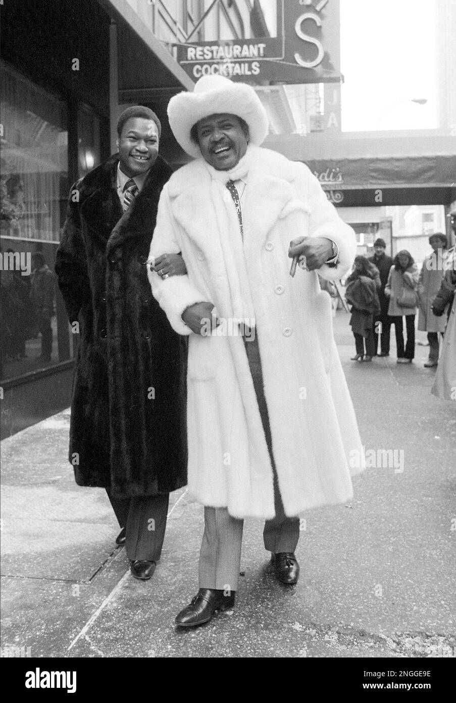 Boxing promoter Don King, right, and heavyweight champion Larry Holmes