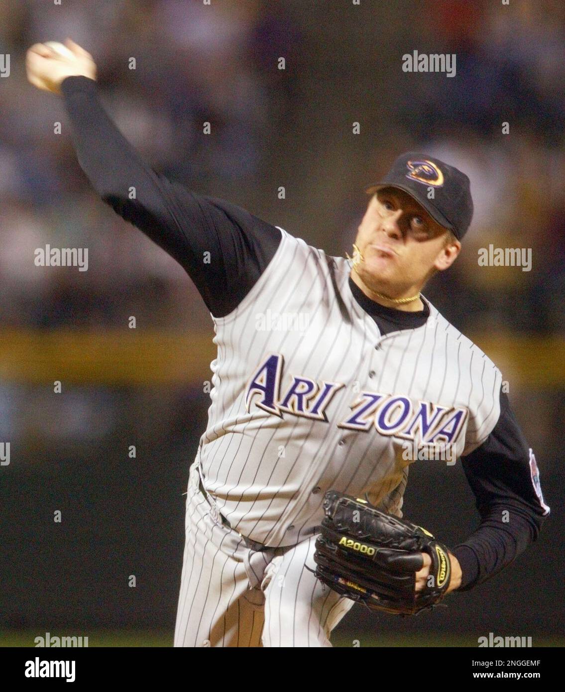 Arizona Diamondback starter Curt Schilling delivers against the St. Louis  Cardinals in the third inning of Game 5 of the National League Division  Series at Bank One Ballpark in Phoenix, Ariz., Sunday, Oct. 14, 2001. (AP  Photo/Matt York Stock Photo - A