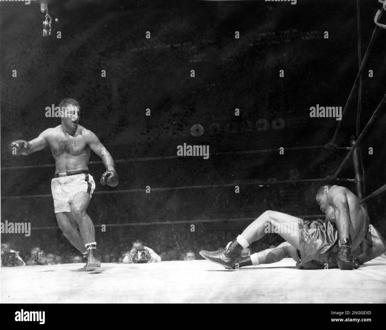 Joe Louis' Last Professional Boxing Fight. He Sinks Through The Ropes In An  Eighth-Round Knockout By Rocky Marciano In Madison Square Garden. Oct. 27  History - Item # VAREVCHISL033EC660 - Posterazzi