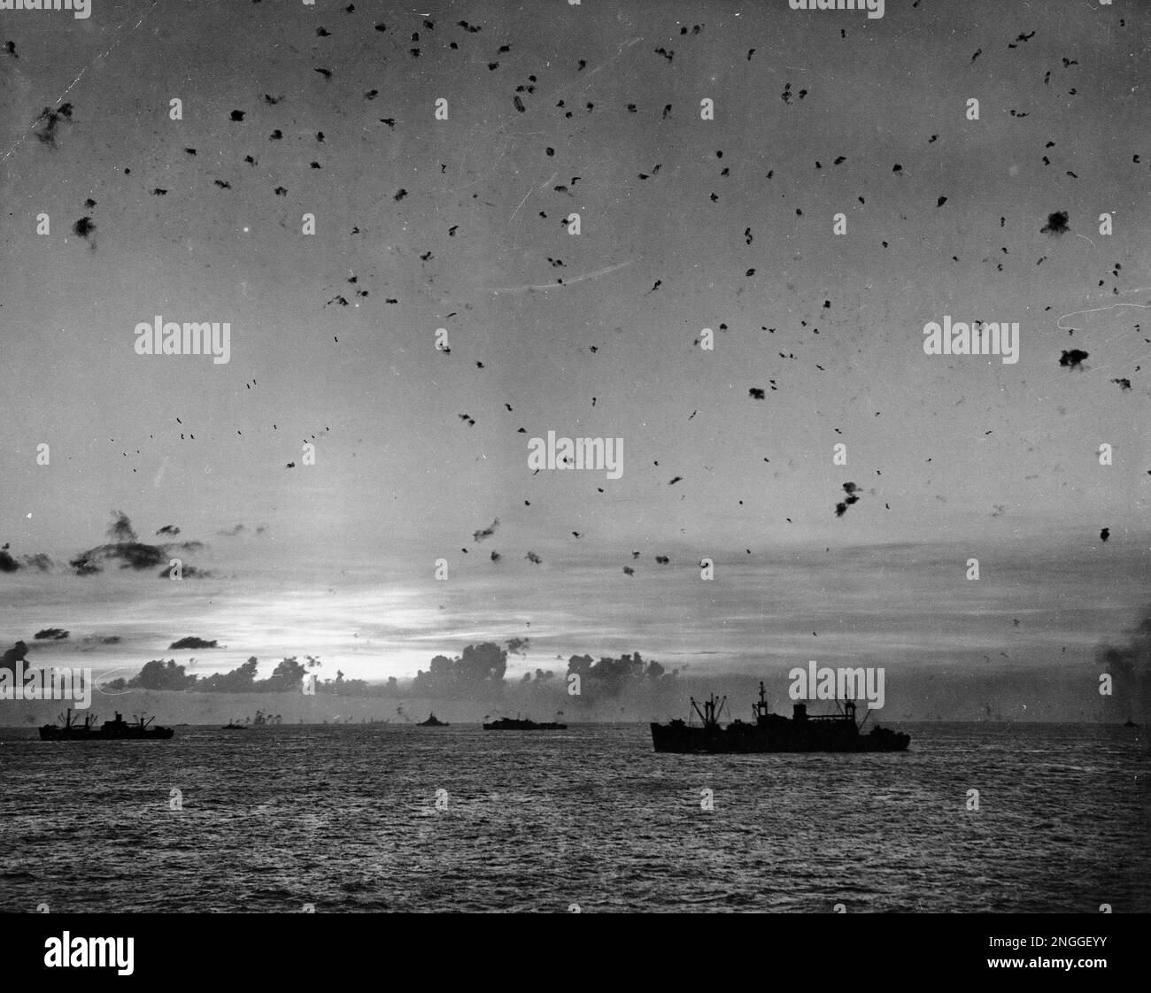 Flak fills the sky as U.S. antiaircraft guns fight off a Japanese ...