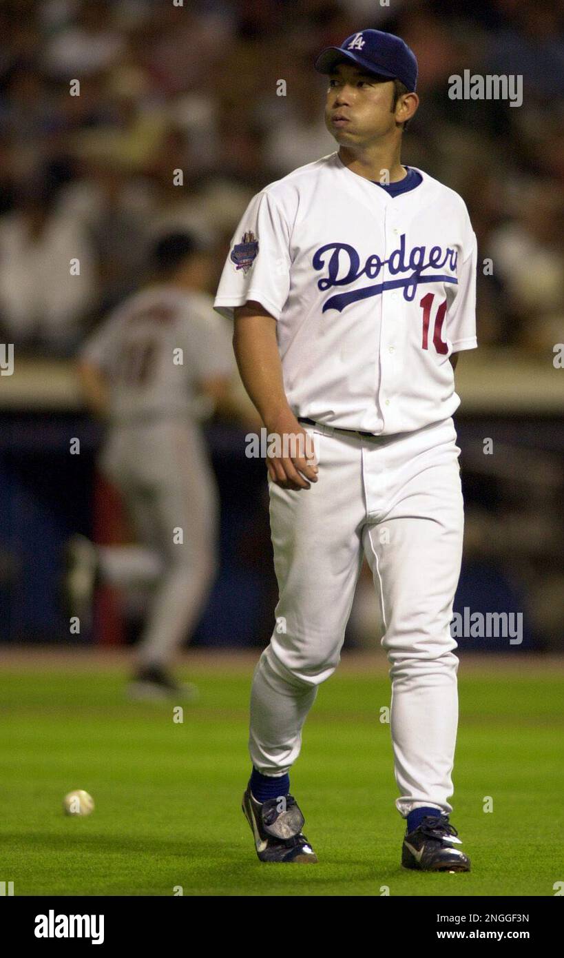 Los Angeles Dodgers pitcher Hideo Nomo walks off the field during