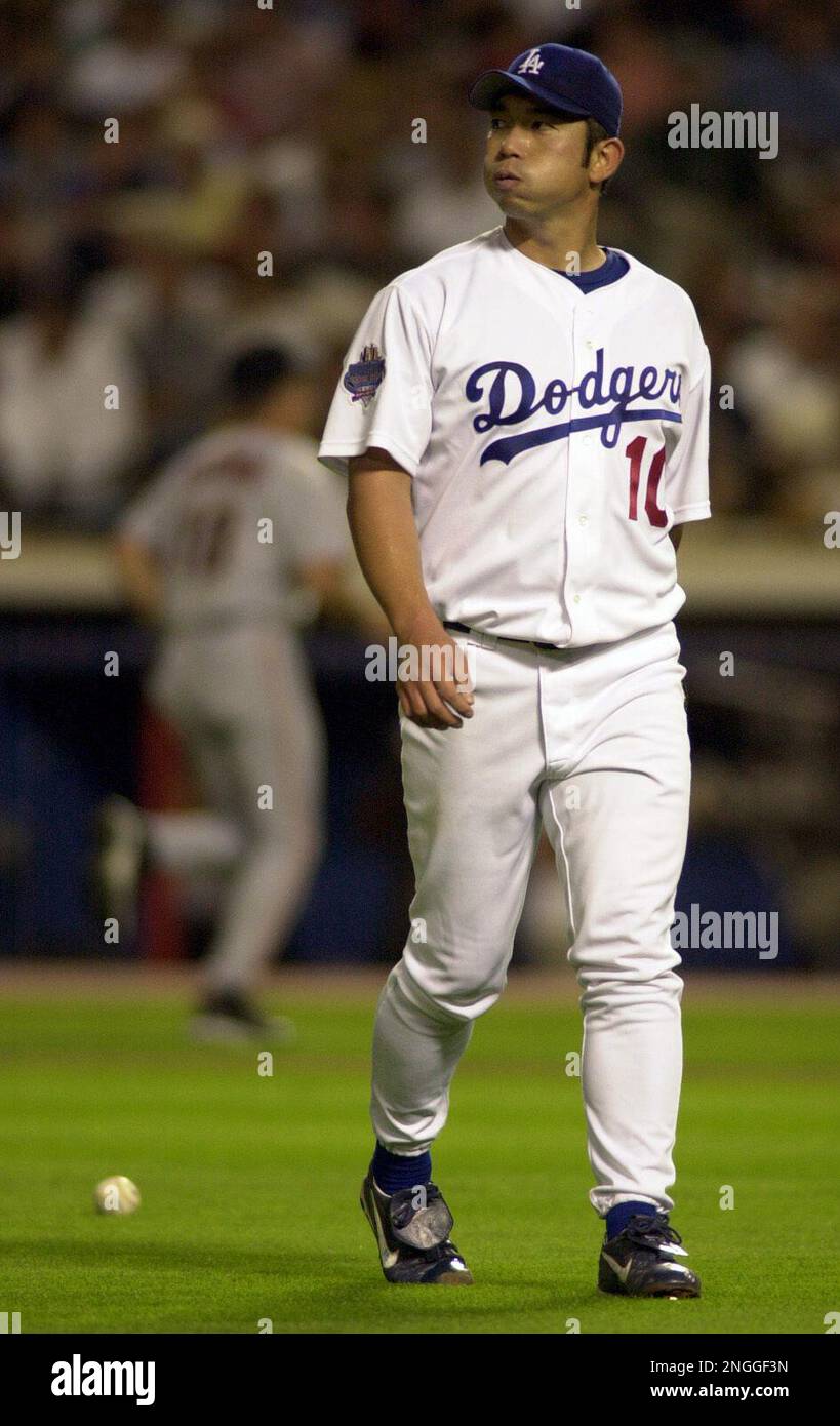Los Angeles Dodgers pitcher Hideo Nomo walks off the field during 