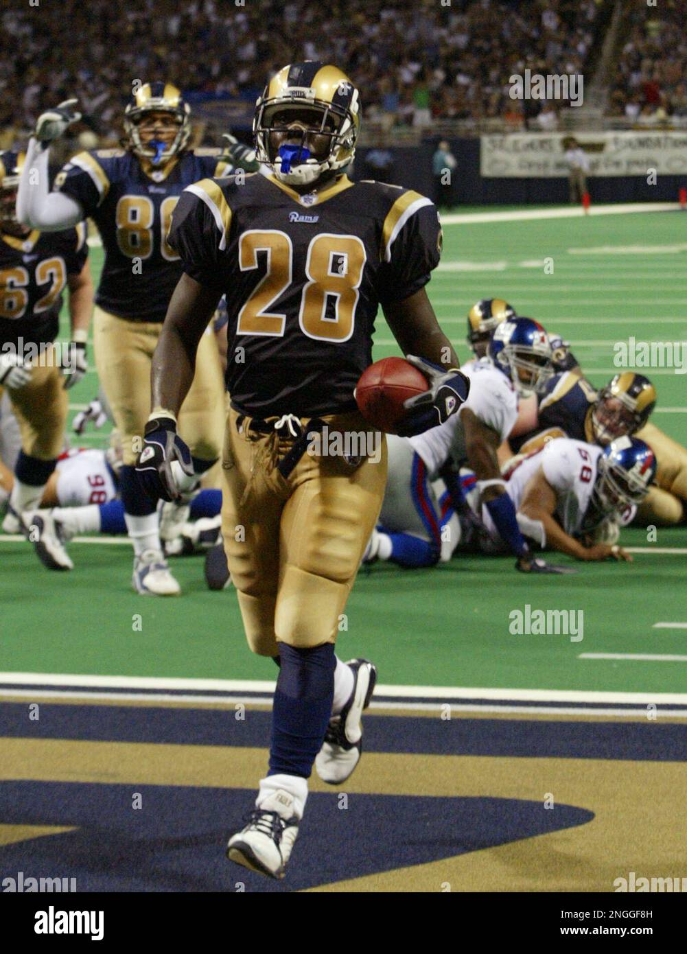 St. Louis Rams Marshall Faulk walks off the field after a 17-16 loss to the  Philadelphia Eagles at the Edward Jones Dome in St. Louis on December 18,  2005. Faulk had 87