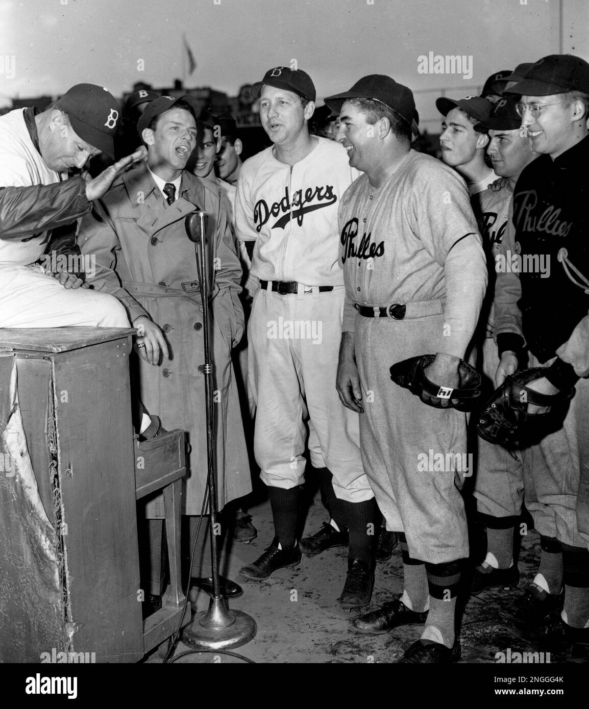 Frank Sinatra sings at the Red Cross War Fund baseball game between the