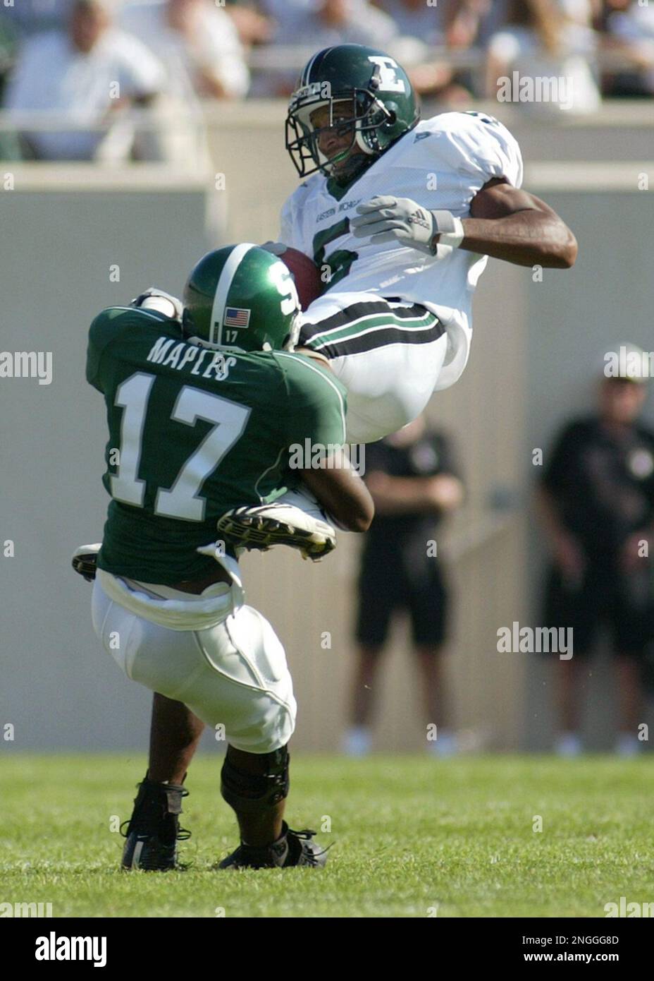 Michigan State's Roderick Maples (17) stops Eastern Michigan's Chris Talley&nbsp; after a pass reception during the second quarter Saturday, Aug. 31, 2002,&nbsp; in East Lansing, Mich. (AP Photo/Al Goldis Stock Photo - Alamy