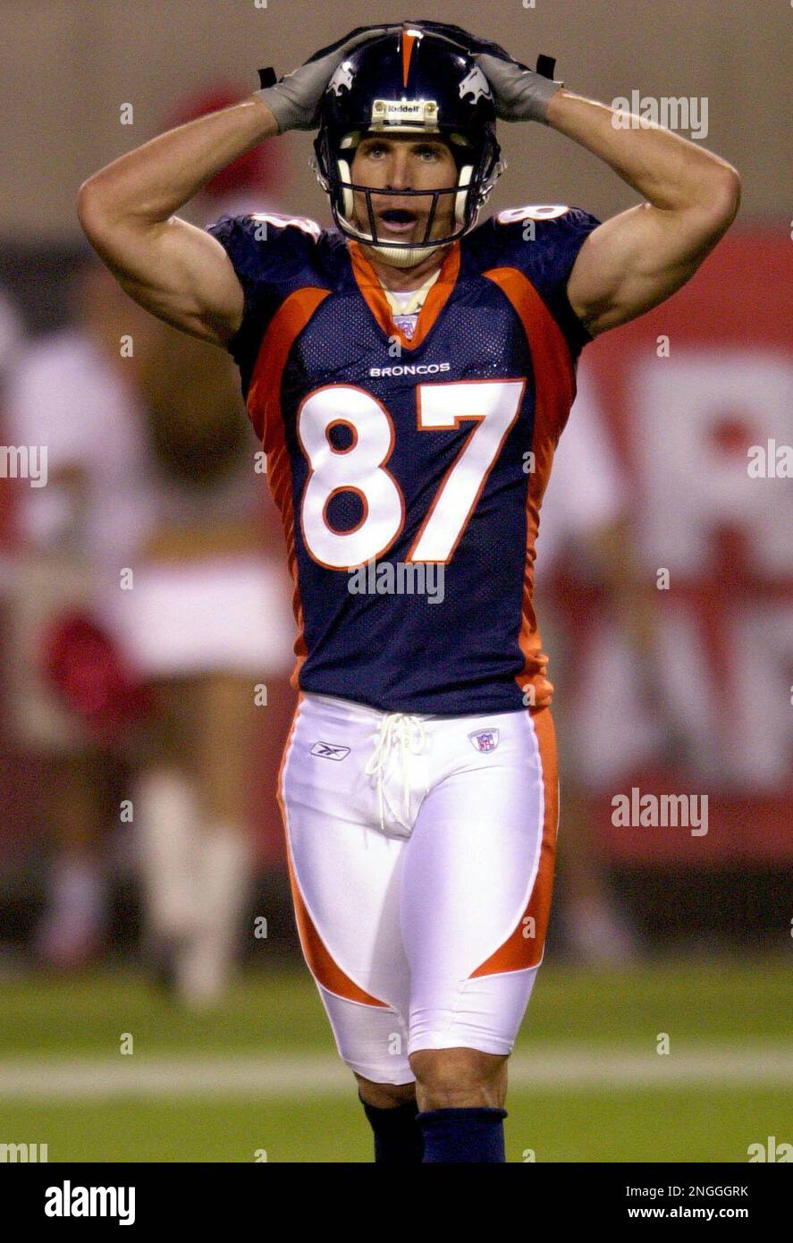 Denver Broncos wide receiver Ed McCaffrey reacts to his team's