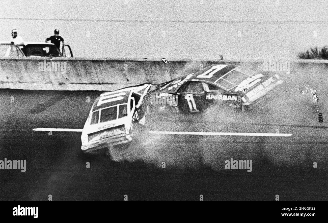 Donnie Allison, in car 1, and Cale Yarborough, in car 11, crash on the
