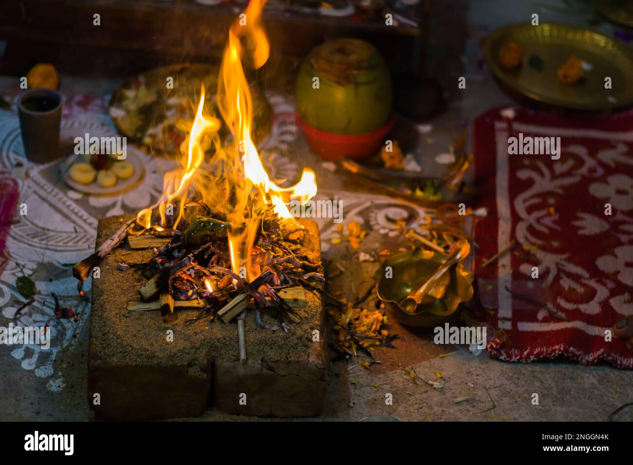 Hindu pooja ritual yagya or yajna, which is fire ceremony performed during marriage, puja and other religious occasions as per vedic traditions of sac Stock Photo