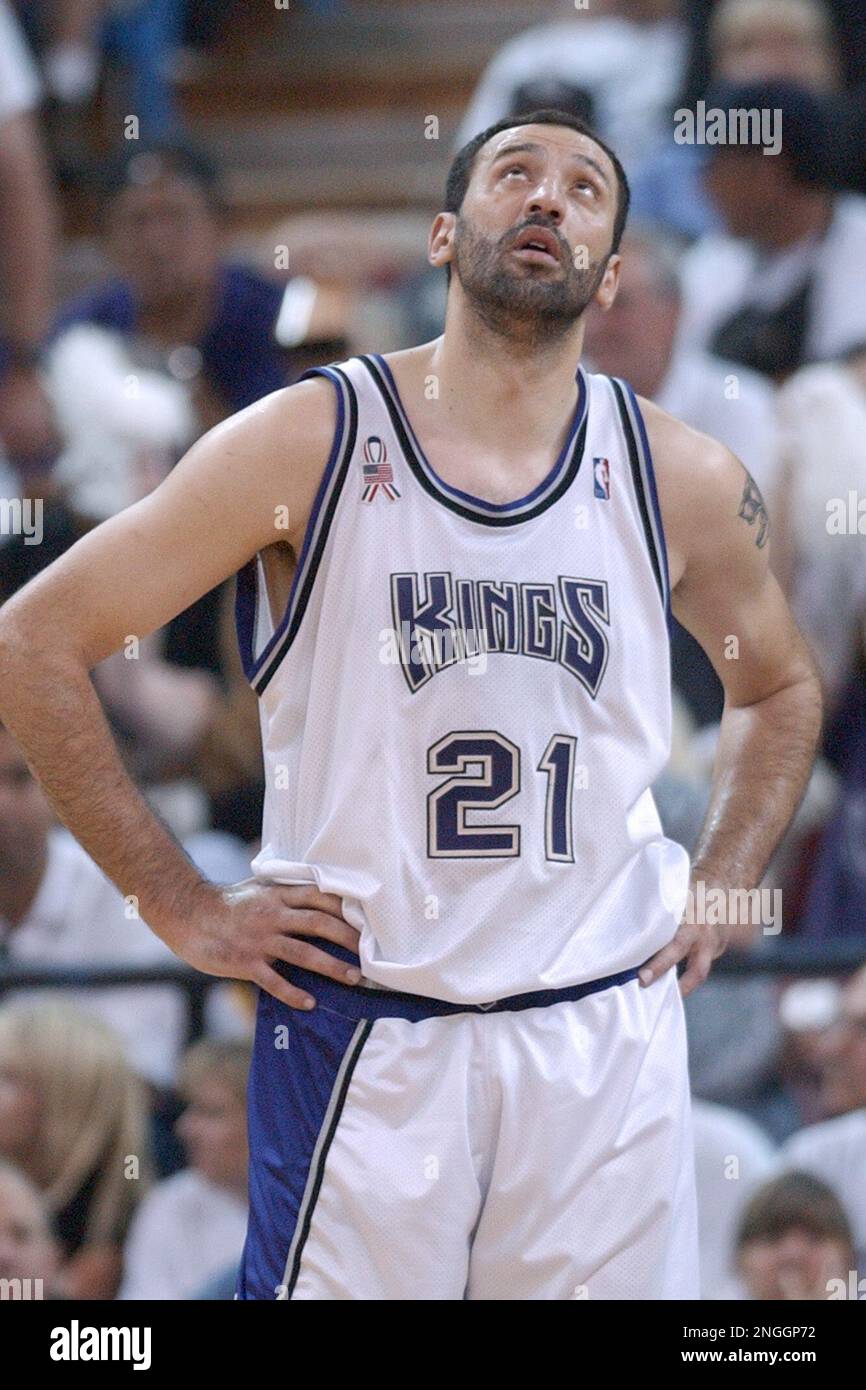 Sacramento Kings' Vlade Divac looks up as he loses the ball in the second  quarter against the Los Angeles Lakers in Game 6 of the Western Conference  finals in Los Angeles., Friday