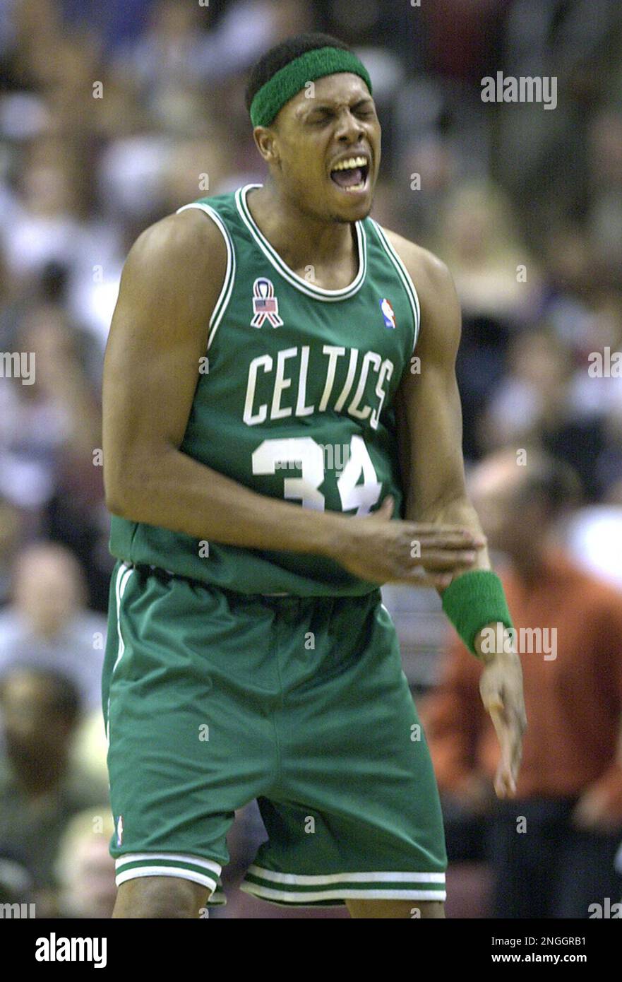 Boston Celtics Paul Pierce reacts after being charged with a