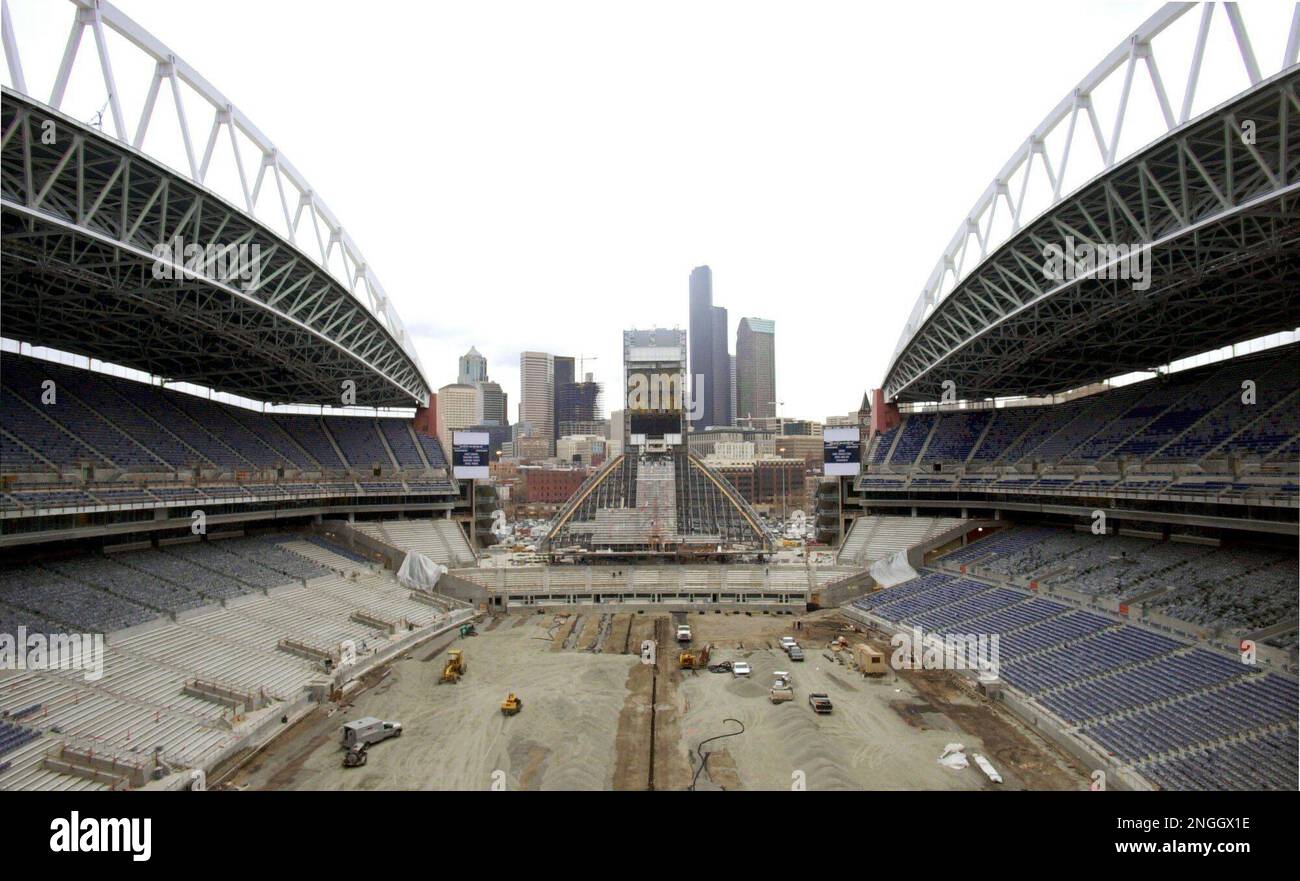 Construction on the Seattle Seahawks' new stadium continues Wednesday,  March 27, 2002, in this view looking north toward downtown Seattle. The  team will begin playing in the 67,000-seat stadium this fall. The