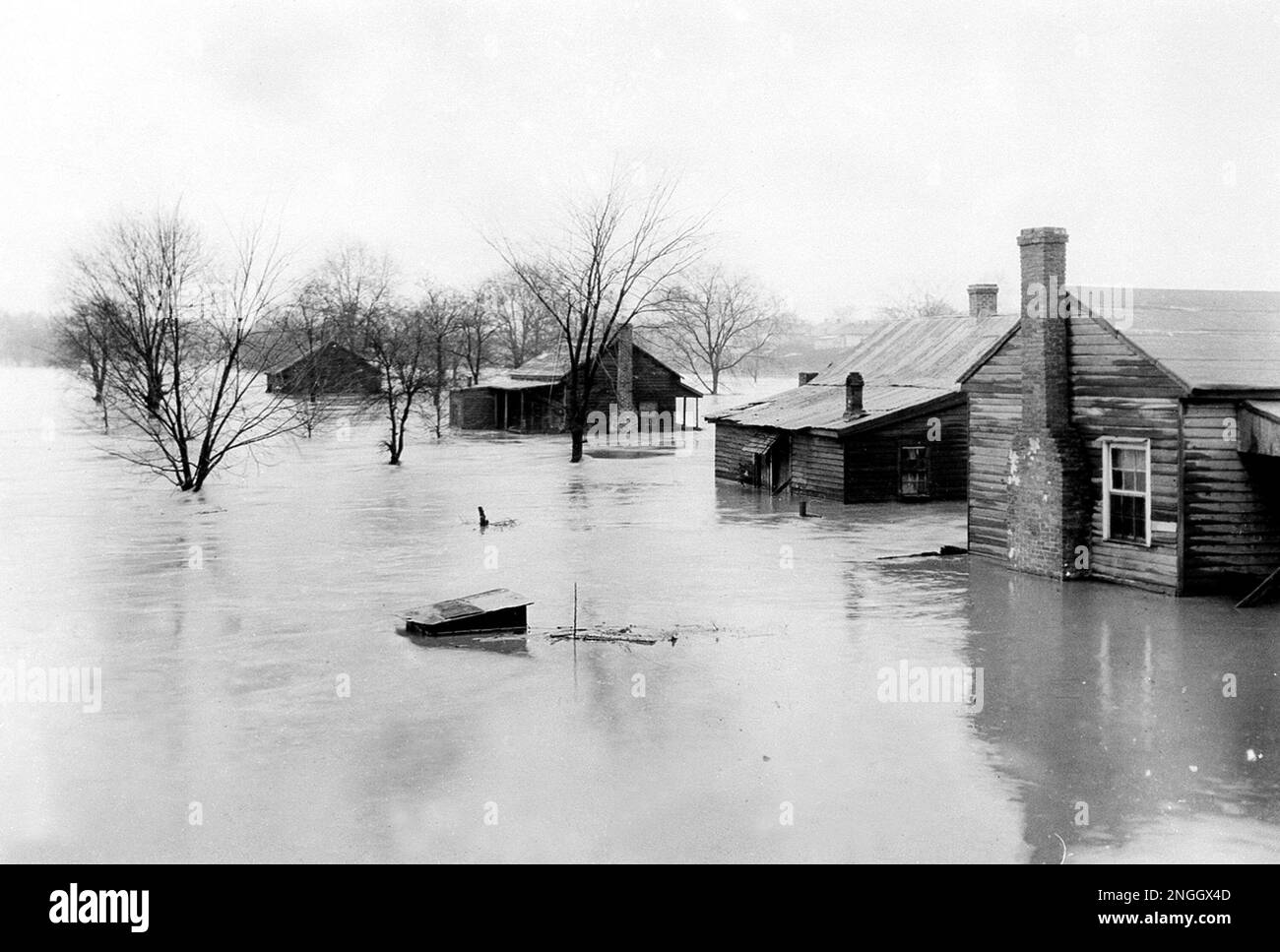 Houses are submerged under water along the Ocmulgee River at Macon, Ga., Jan. 22, 1925. The
