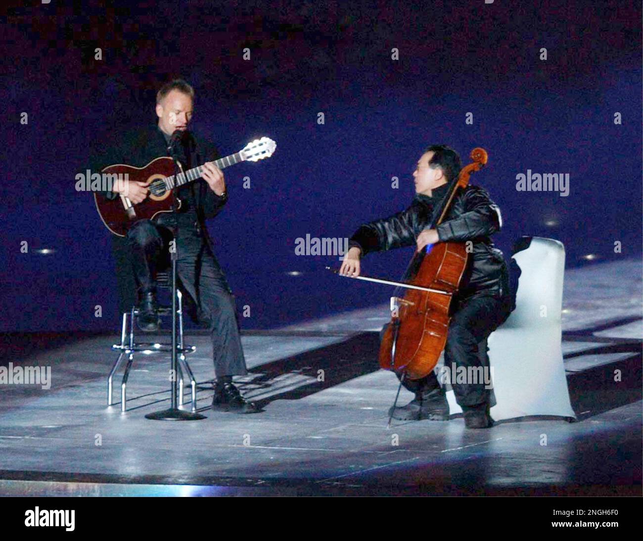 Musicians Sting, left, and Yo Yo Ma perform during the opening ceremonies  of the 2002 Winter Olympics in Salt Lake City Friday, Feb. 8, 2002. (AP  Photo/Elaine Thompson Stock Photo - Alamy