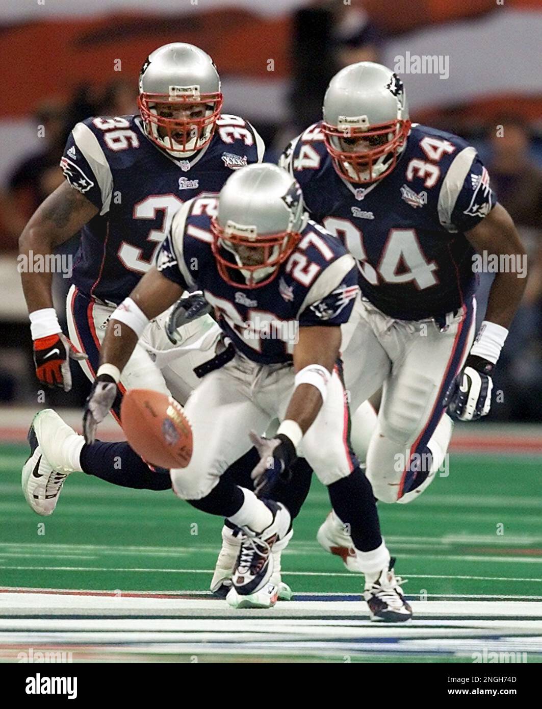 New England Patriots' cornerback Terrell Buckley (27) scoops