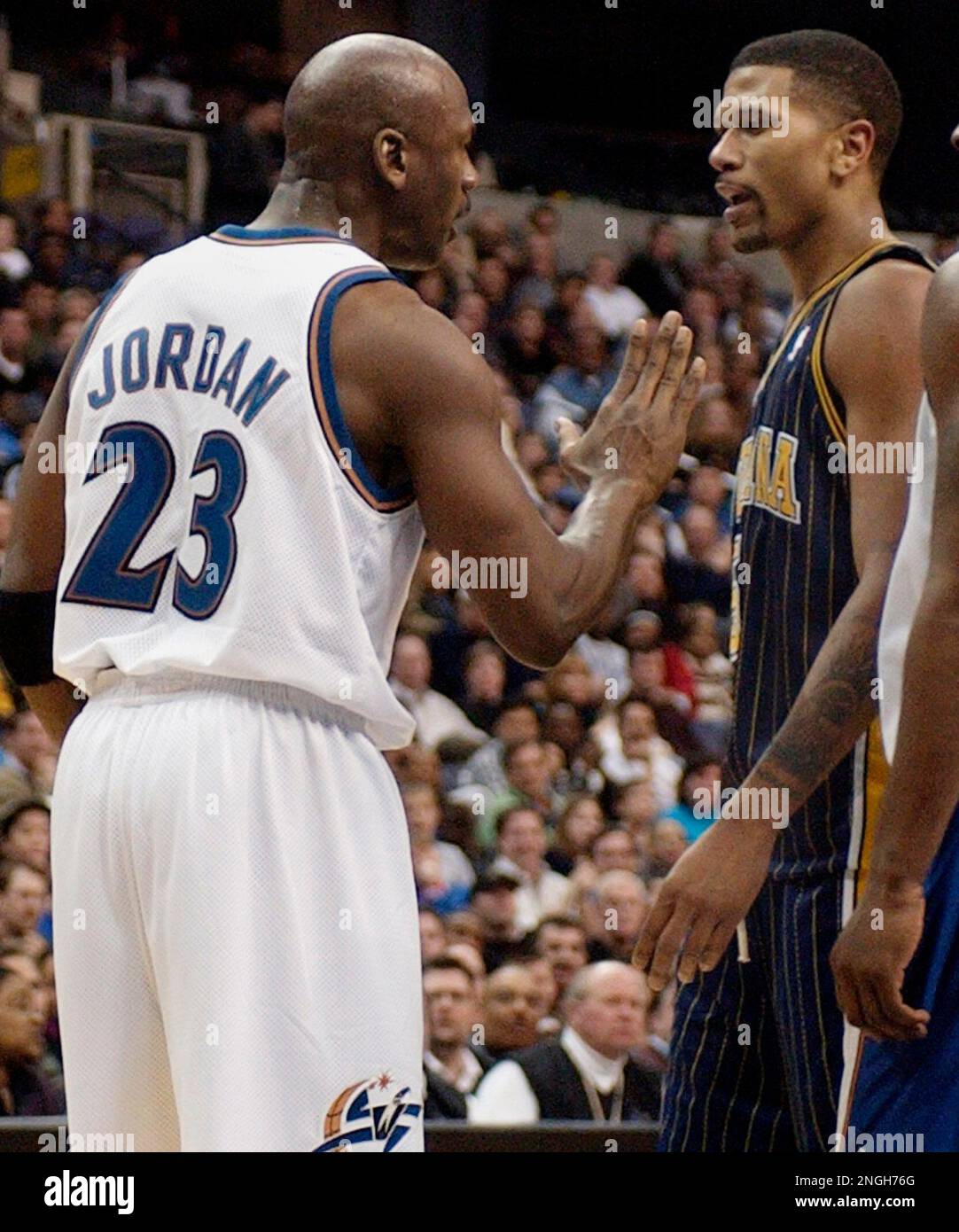 Washington Wizards' Michael Jordan, left, has words with Indiana