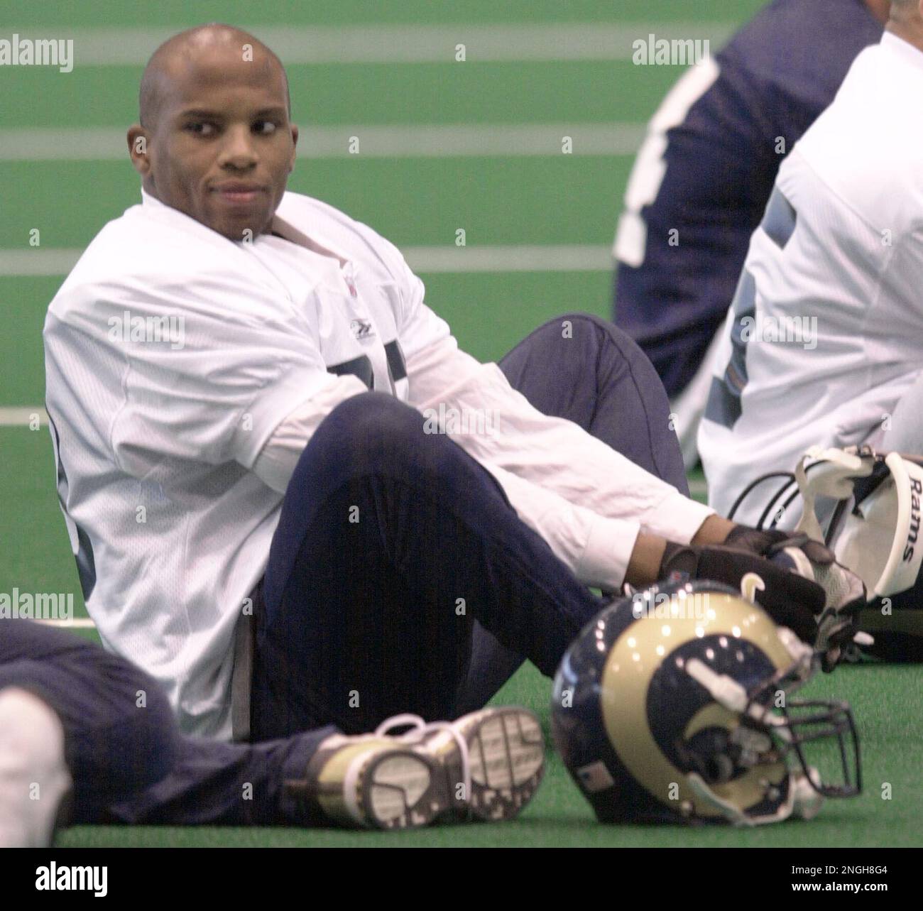 St Louis Rams safety Kim Herring stretches before practice at Rams Park