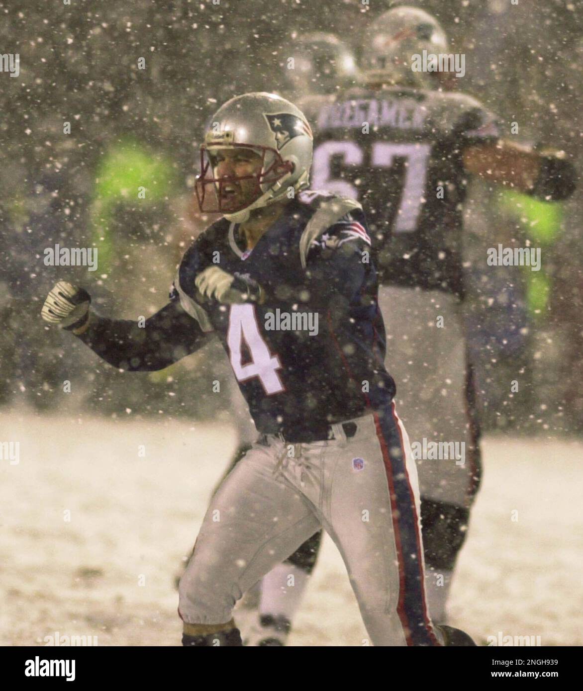 Patriot's kicker Adam Vinatieri (4) celebrates with Ken Walter (13