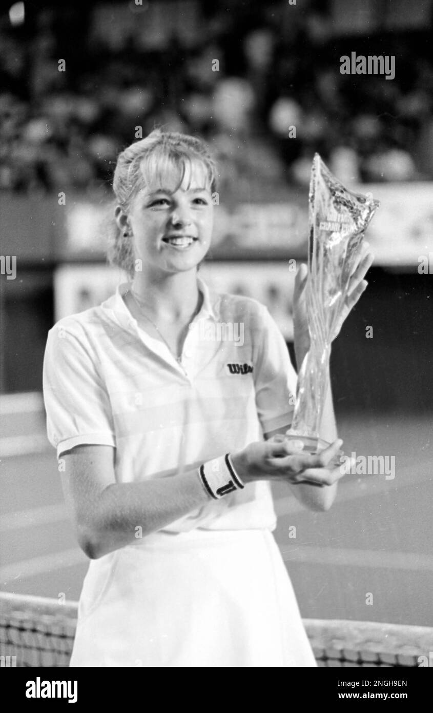 Lisa Bonder displays her trophy after winning the Queen's Grand Prix