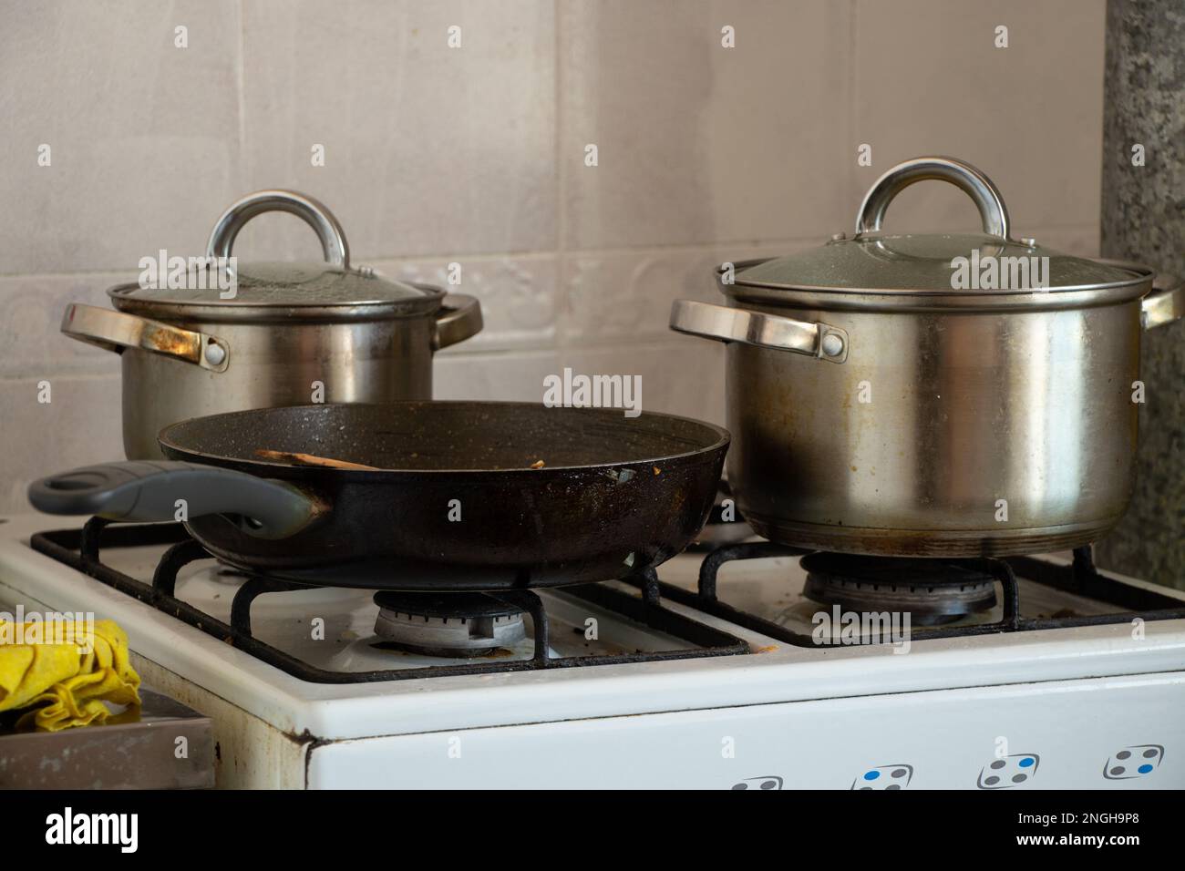 pots are on the gas stove in the kitchen at home, cook on the stove Stock Photo