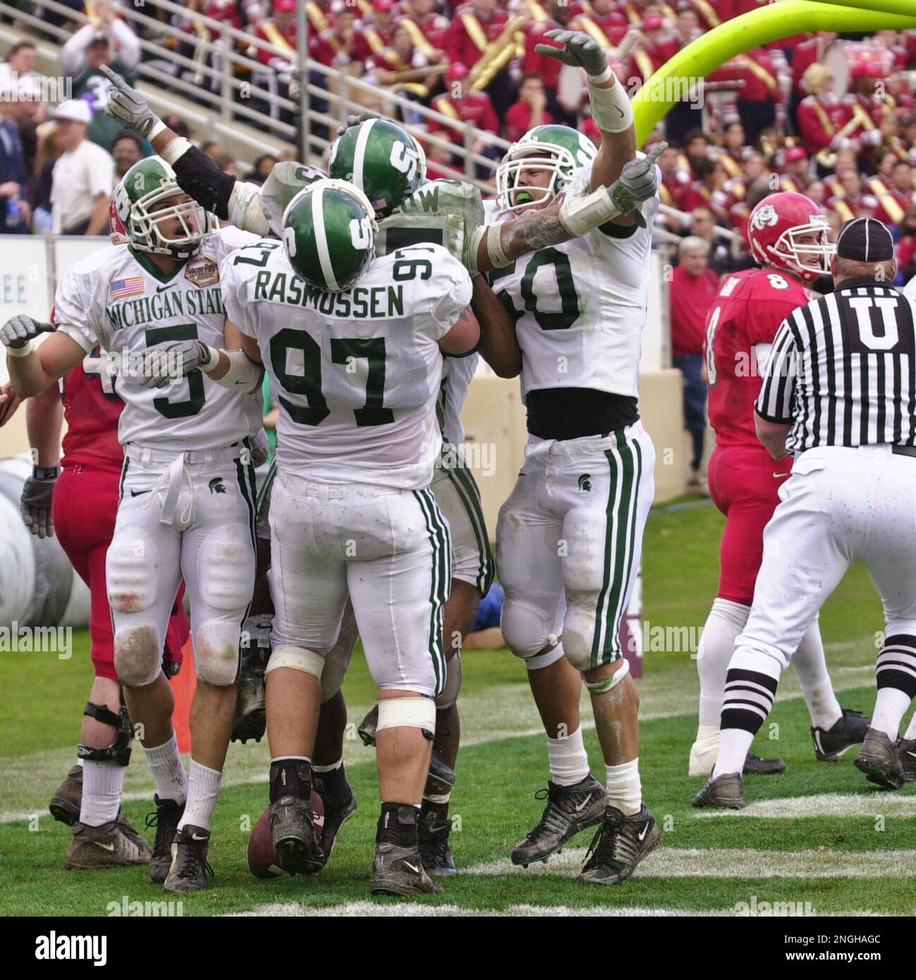 Michigan State linebacker Monquiz Wedlow, center, is congratulated by