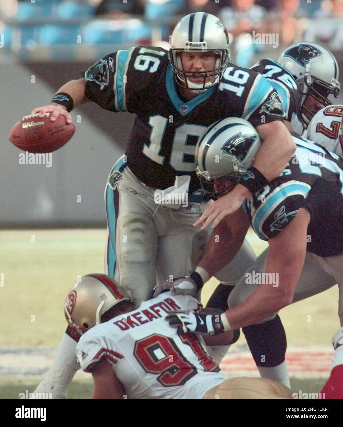 Carolina Panthers quarterback Chris Weinke (16) is hit by San Francisco