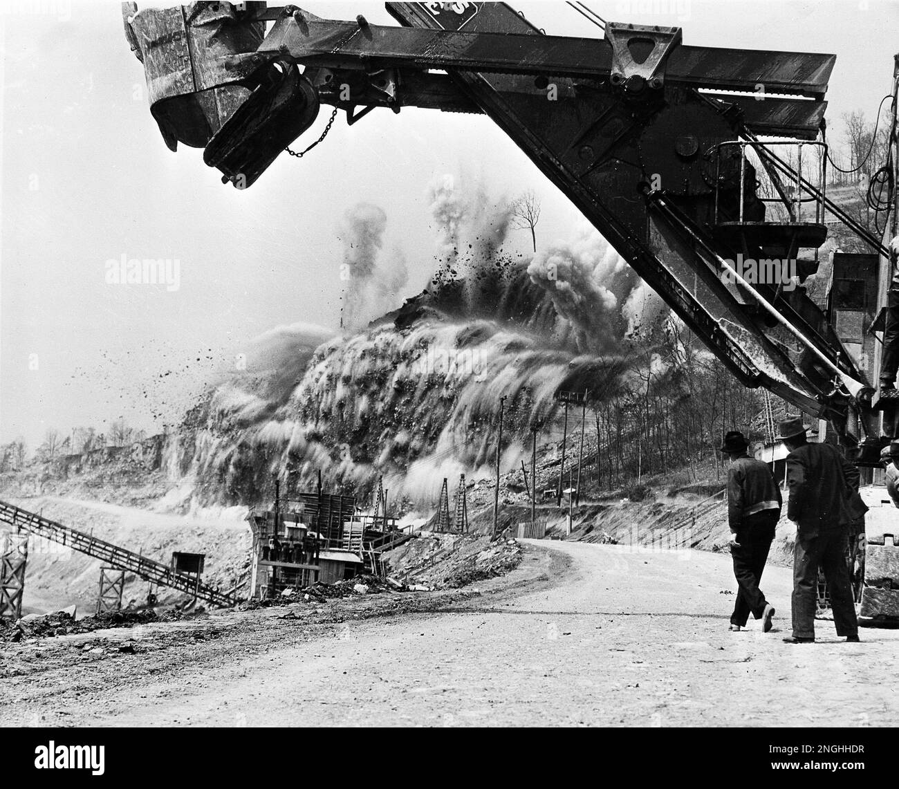 Nearly 125,000 pounds of explosives go off in a blast to slice of a half  million tons of limestone rock near Jefferson City, Tenn., March 22, 1941.  The limestone will be used