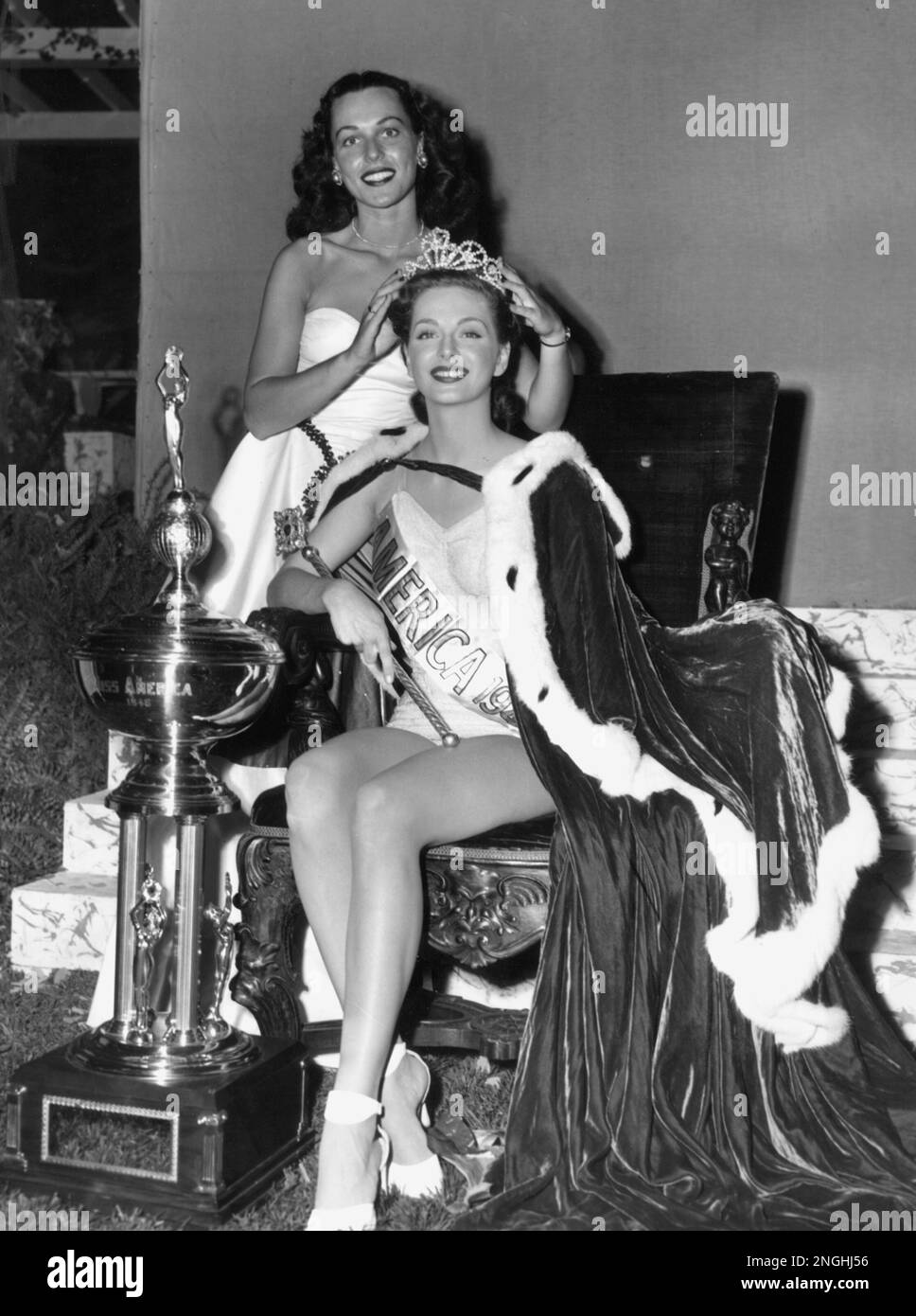 Marilyn Buferd, of Los Angeles, Ca., sits on the throne wearing the ...